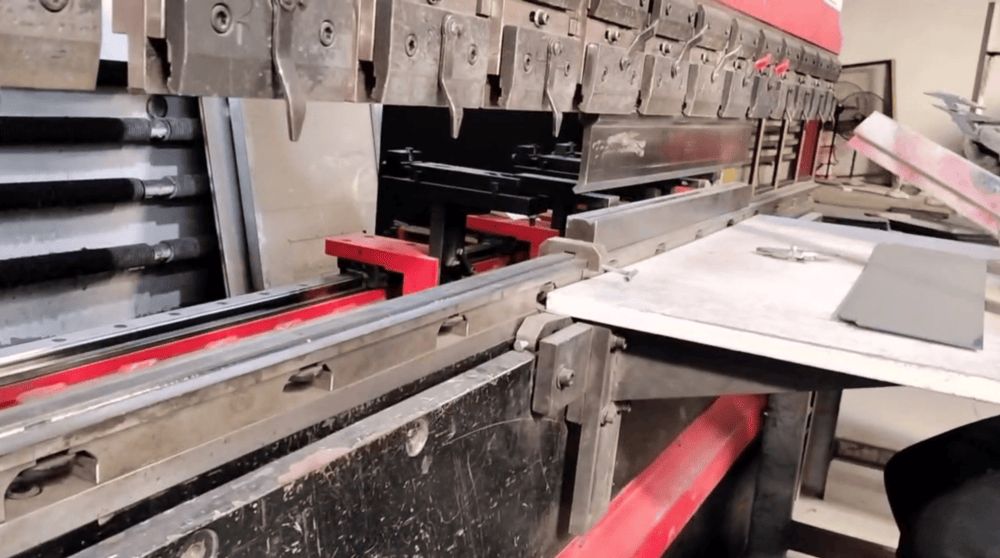 Programmable CNC press brake bending sheet metal parts for vending machine enclosures