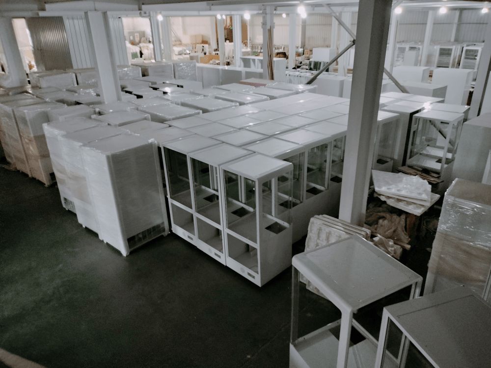 Manufacturing facility warehouse with finished goods organized by order