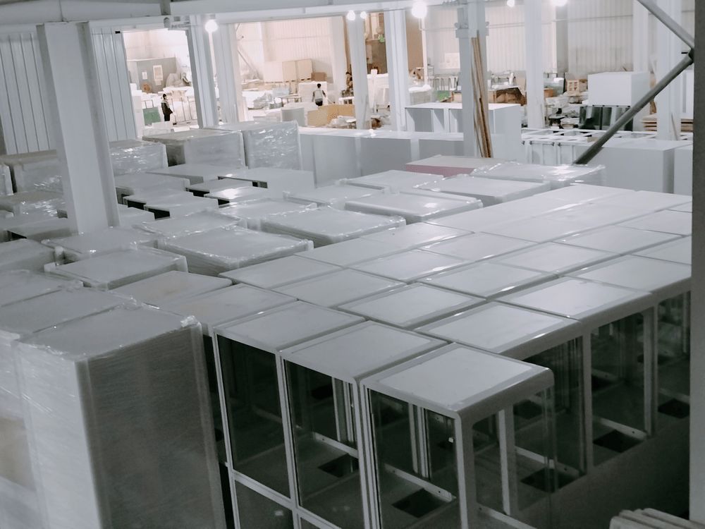 Loading bay area — crated machines ready for container loading and export shipping